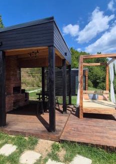 Gilau House | Oceanfront Elysium Cabin: 4-Star Retreat with Pool Access