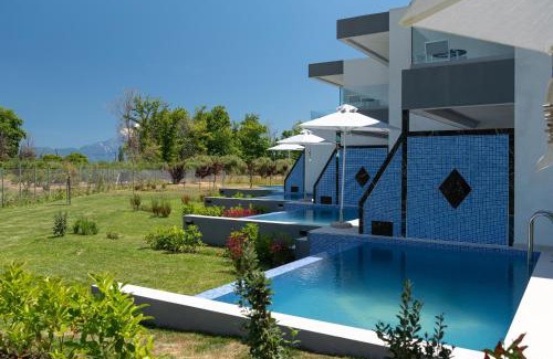 Sarti Villa | Elegant Elysium Villas Quartet with Ocean Views & Pool