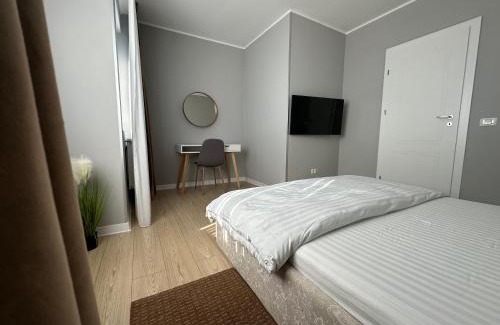 Tirgu Jiu Apartment | Stylish 2-Bedroom Apartment with 9.2/10 Guest Rating