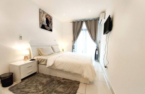 Xuan Tao Apartment | Discover Embassy Gardens 2 Bed Apartment in Cantonments