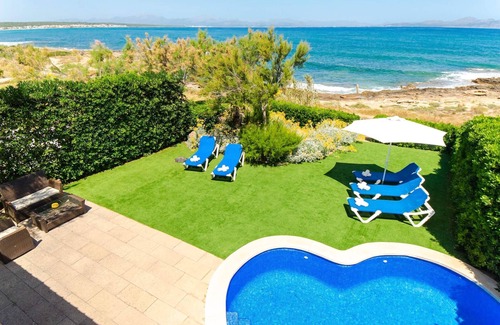 Urbanizacion S'Estanyol Villa | EMBAT: Seafront Retreat with Pool and Family Amenities