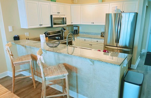 West Panama City Beach Condo | Beachfront Bliss with Chair Service and Top Guest Rating!