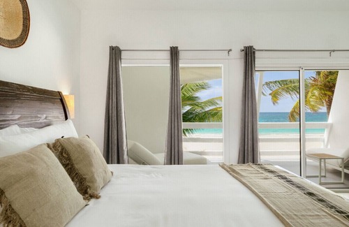 Beacon Hill Hotel | Oceanfront Emerald Room #2 at CocoVaa Boutique Hotel