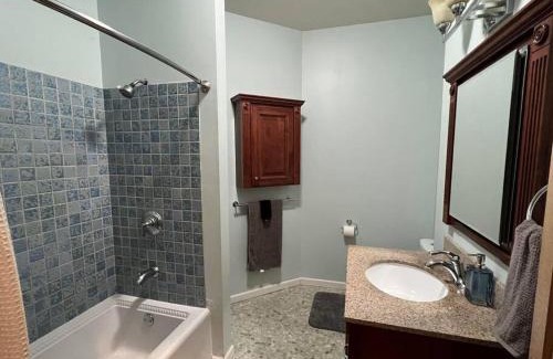Lake Michigan Beach House | Relax at Emerald Shores: Pet-Friendly Hotel with Hot Tub