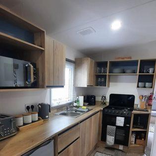Port Seton House | Emi's Caravan: Guest Rated 9.3 with Private Pool & Family Fun