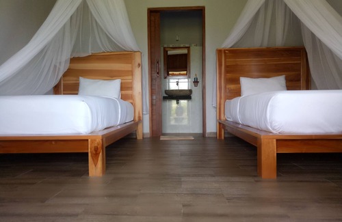 Medewi Bed & Breakfast | Experience Emir Surfcamp: Top-Rated Getaway with Spa & Dining