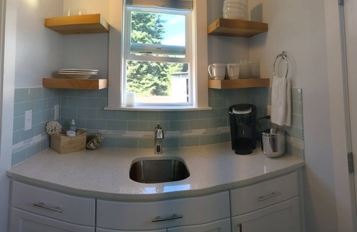 Coeur d'Alene House | Discover Emma's Garden: Family-Friendly with Spa Access