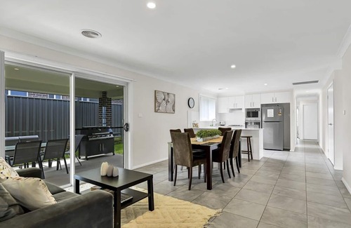 Orange House | Emmaville - Modern, Convenient Stay with Pet-Friendly Amenities