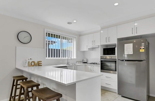 Orange House | Emmaville - Modern, Convenient Stay with Pet-Friendly Amenities