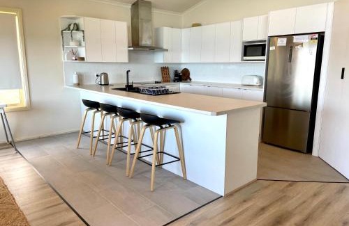 Emu Bay House | Cozy Emu Bay Lodge: Oceanfront Retreat with Pet-Friendly Charm