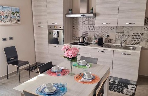 Gela Apartment | Emy House: Oceanfront Retreat with Pool & High Ratings