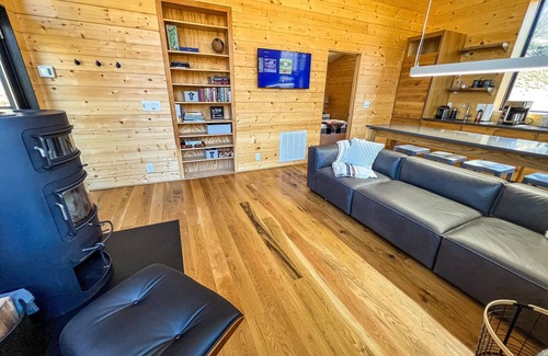 West Jefferson Cabin | Enchanting Mountain Retreat with Hot Tub & Creekside Views
