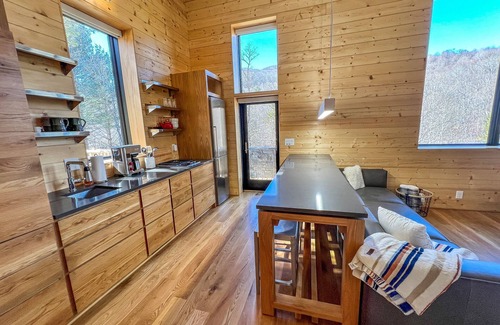 West Jefferson Cabin | Enchanting Mountain Retreat with Hot Tub & Creekside Views