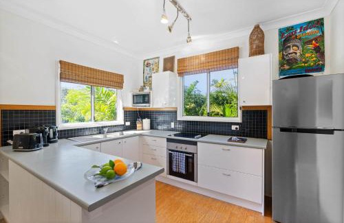 Brisbane Waterfront House | Magical Garden Cottage with Bikes for Family Getaways