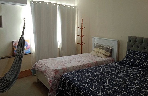 Pontal de Camburi Apartment | Delightful Retreat with Private Pool and Lake Views