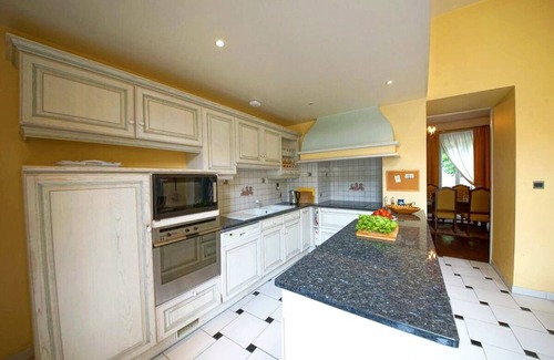 Riberac Villa | Inviting Mansion with Heated Pool and Peaceful Garden Oasis
