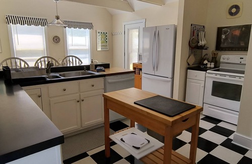 Elk Rapids House | Exceptional Elk Rapids Victorian Steps from Beaches & Spa