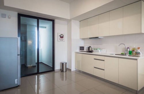 The Strand Hotel | Modern Encorp Strand Residences: Pool, Spa & Dining Await