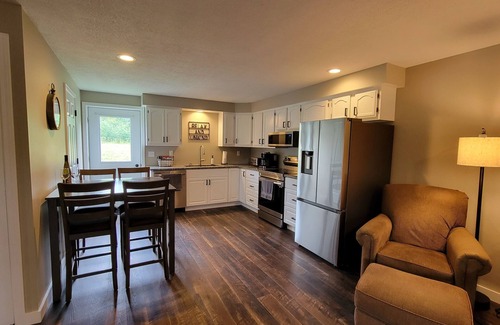Burdett Apartment | Exceptional End-Unit Apartment with Lawn & Family Amenities