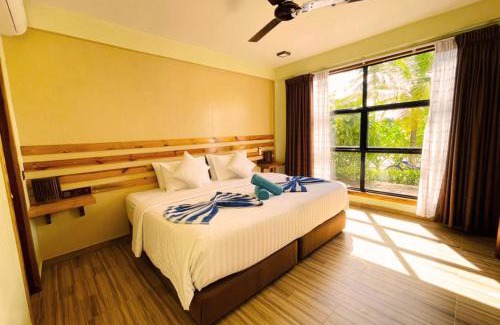 Dhangethi Hotel | Idyllic Endheri Sunset Dhangethi with Private Beach Access