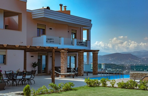 Ammoudara Villa | Endless View Villa: 4-Bedroom Oceanfront Getaway