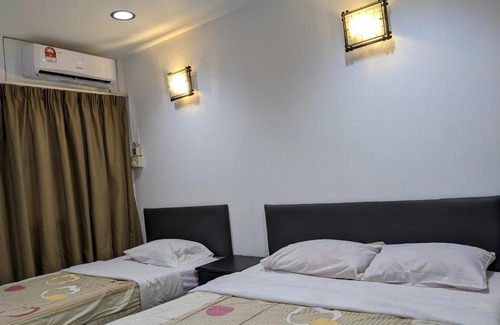 Bandar Kota Bharu Hotel | Budget-Friendly ENE Inn with Family Amenities & Breakfast