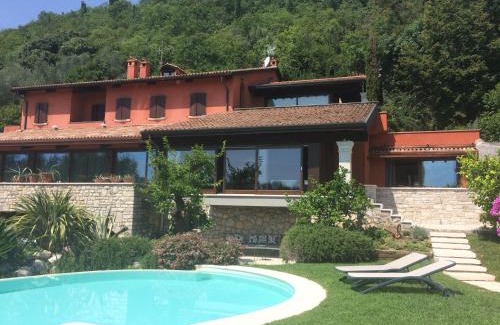 Cecina Apartment | Discover Energaia: Oceanfront Retreat with Pool & 9.5/10 Rating