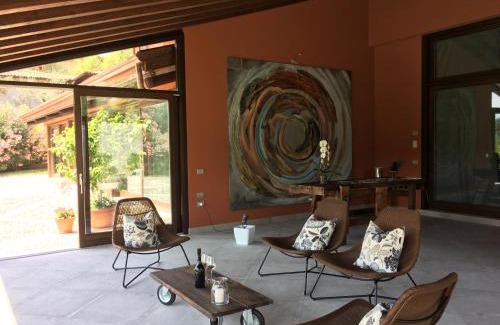 Cecina Apartment | Discover Energaia: Oceanfront Retreat with Pool & 9.5/10 Rating