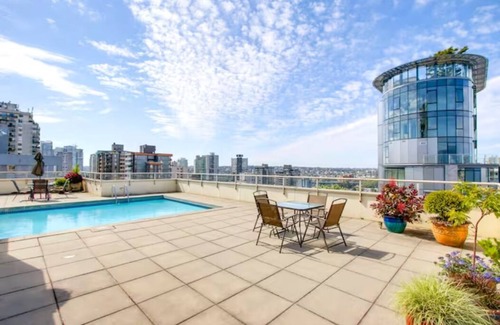 West End Apartment | English Bay Views - Cozy Davie Village apartment with rooftop pool deck!