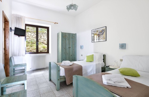 Oliena Hotel | Discover Enis Monte Maccione: Spa & Family-Friendly Stay