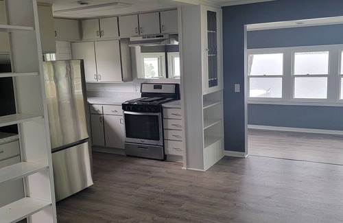 Delton House | Brightly Remodeled Cottage Steps from the Beach & Pet Friendly