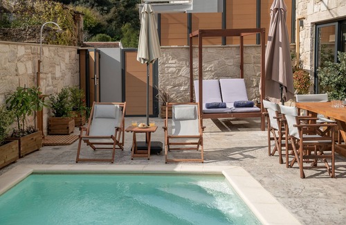 Bouvet Island Villa | Relax with Wine by the Pool at Our Family-Friendly Hotel