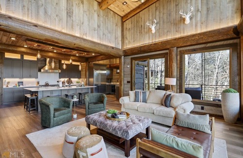 Epworth Cabin | Unwind at Miracle Creek: Riverfront Poolside Bliss