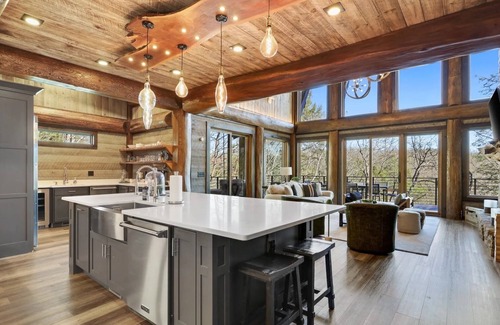 Epworth Cabin | Unwind at Miracle Creek: Riverfront Poolside Bliss