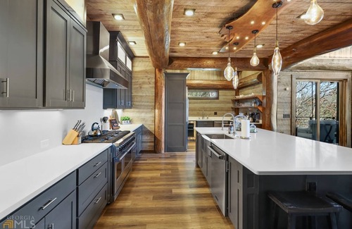 Epworth Cabin | Unwind at Miracle Creek: Riverfront Poolside Bliss