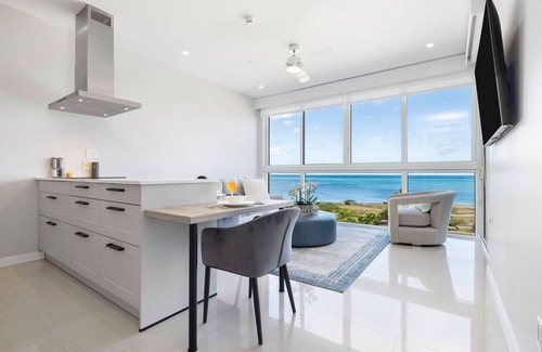 Palm Beach Condo | Enjoy peace of mind at Mi casa Su casa - Ocean view Condo