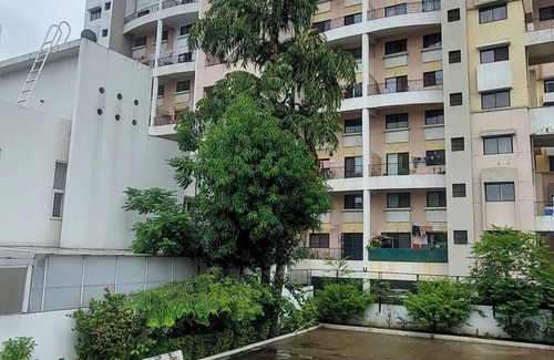 Magarpatta City Apartment | Unwind with Scenic Views in Magarpatta City