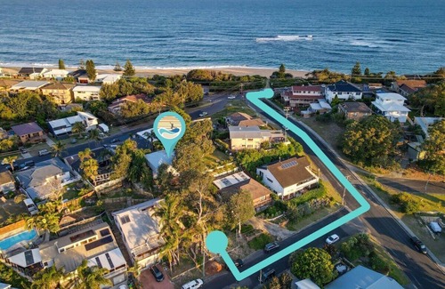 Forresters Beach House | Relax on the Seabreezing Deck with Oceanfront Views