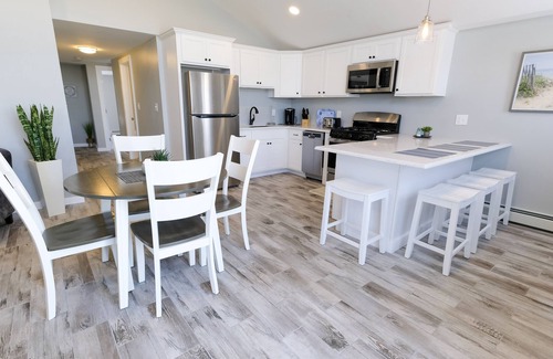 Seabrook House | Beachfront Bliss: Experience Daylight Waves and Twilight Views