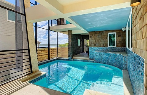 Bethune Beach House | Unwind by the Riverfront Pool at Redfish Dance Home