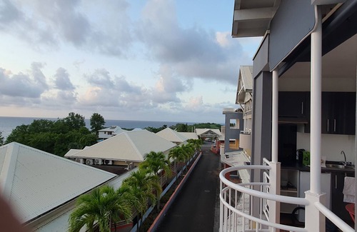 Tartane Apartment | Beachfront Oasis with Pool and Ocean View for Families