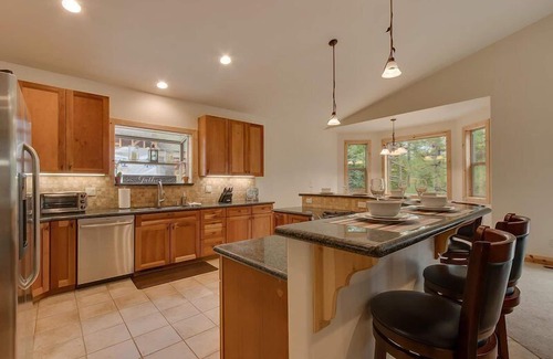 Tahoe Island House | Relax in a Tree-Lined Yard with Deck and Hot Tub Retreat