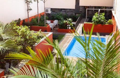 la Vila de Gracia Apartment | Relax at Enjoybcn Patio de Gracia: Pet-Friendly & Poolside