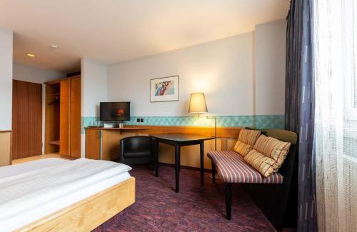 Korntal-Munchigan Hotel | Discover Hotel Garni Korntal Stuttgart with Family-Friendly Perks