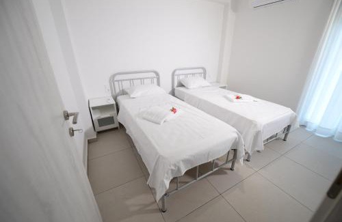 Patras Apartment | Elegant Ennea Suites: Oceanfront Frost Suite Awaits You