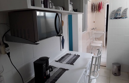Jardim Vitoria Apartment | Relaxing Stay at Enseada/Aquário - Steps from the Beach