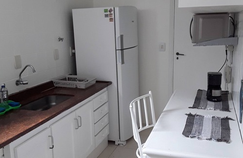 Jardim Vitoria Apartment | Relaxing Stay at Enseada/Aquário - Steps from the Beach