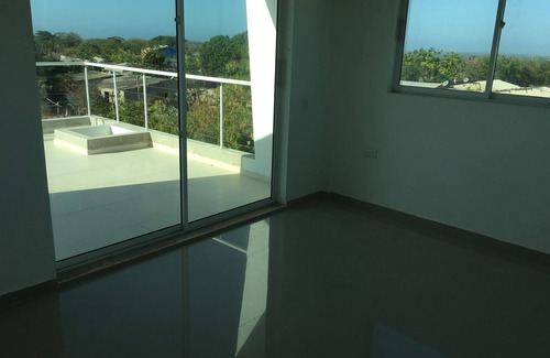 Tierra Bomba Island Apartment | Inviting Apartment with Terraces and Full Kitchen Access