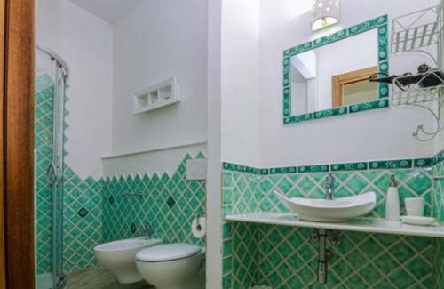 Arbatax House | Spacious 7 Room Apartment with Air Conditioning & Family-Friendly