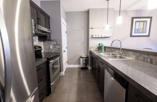 Grande Prairie House | Entire Home 4Bd 3.5Bath | WIFI | Smart TVs